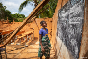 How does the Education in Emergencies sector address climate change issues?